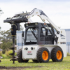 auger drive on skid steer with auger bit