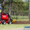 mini skid steer trencher digging trench