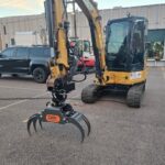 CAT 304 with GRX15 5 Finger Grapple
