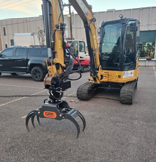 CAT 304 with GRX15 5 Finger Grapple