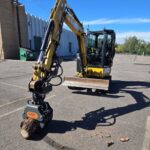 CAT 304 with GRX15 5 Finger Grapple