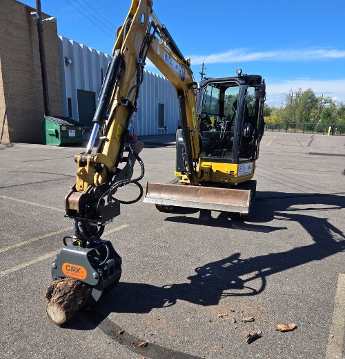 CAT 304 with GRX15 5 Finger Grapple